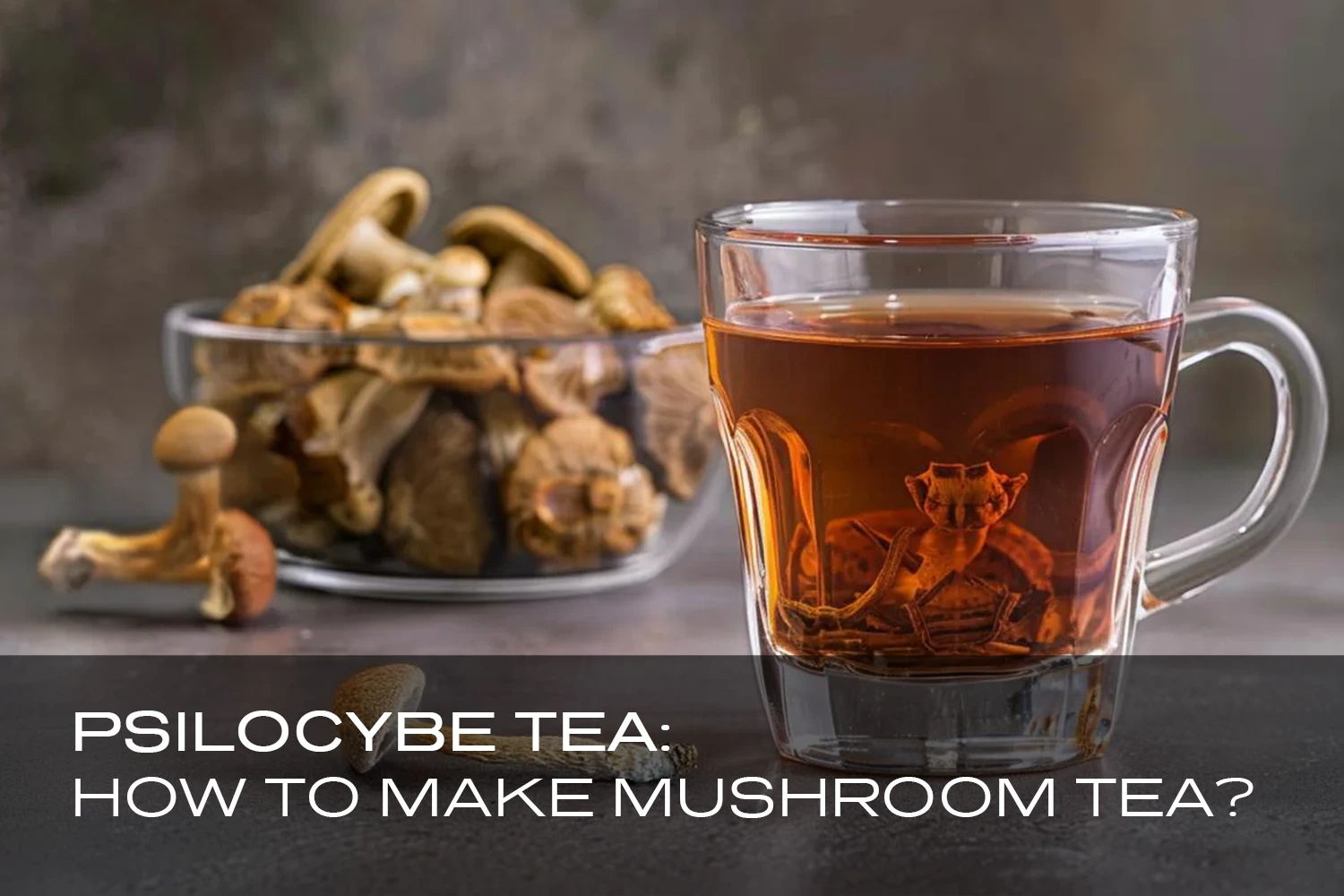 Glass mug of mushroom tea next to a bowl of dried mushrooms.
