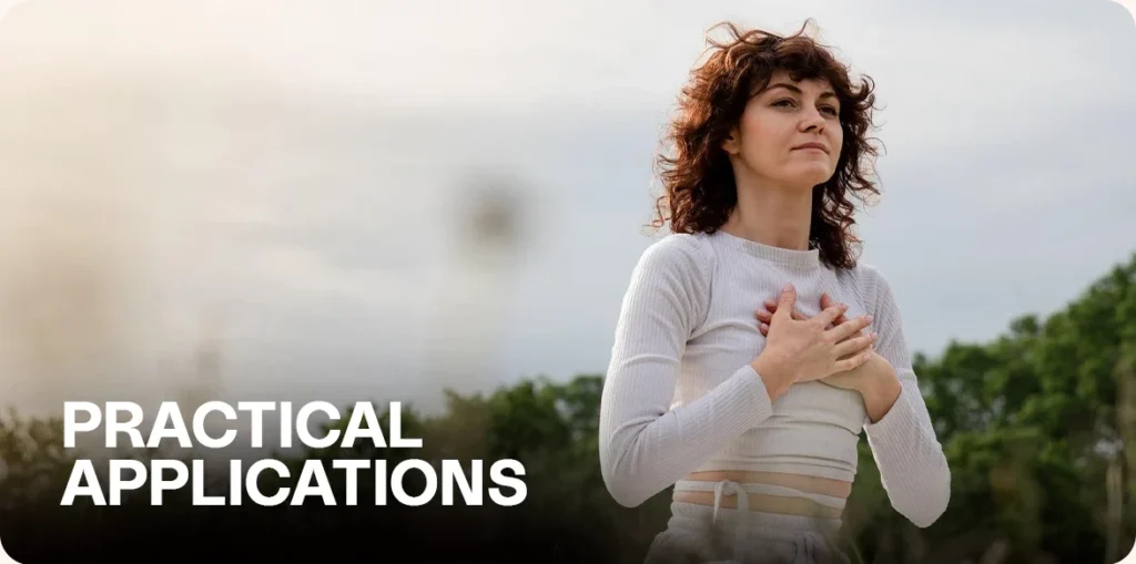 Woman with hands on chest outdoors.