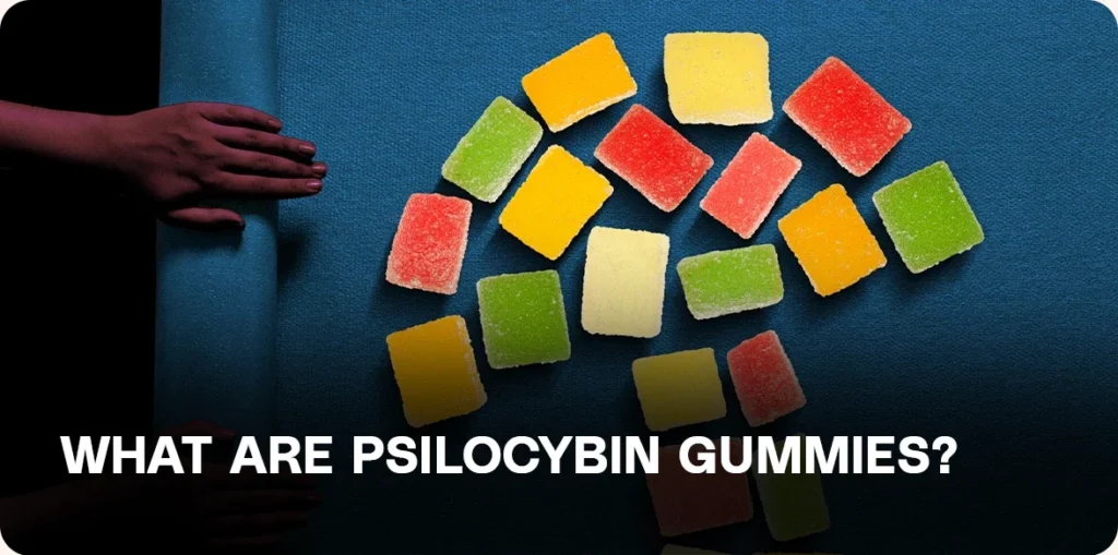 Red, yellow, and green gummies arranged on a blue background.